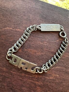 Leonore Doskow Handmade Sterling Silver Bracelet with Signature Letters Design